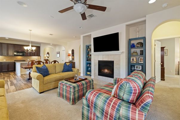 Chandelier, Dining room, Fireplace, Interior, Kitchen, Living room, Pendant Lights, Recessed Lighting, Wood Texture Flooring