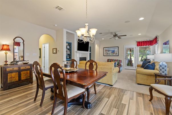 Chandelier, Dining room, Fireplace, Interior, Living room, Recessed Lighting, Wood Texture Flooring