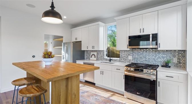 Interior, Kitchen, Pendant Lights, Recessed Lighting, Stainless Steel Appliances, Wood Texture Flooring