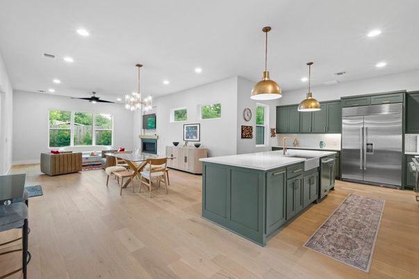 Dining room, Fireplace, Interior, Kitchen, Living room, Pendant Lights, Recessed Lighting, Stainless Steel Appliances, Wood Texture Flooring