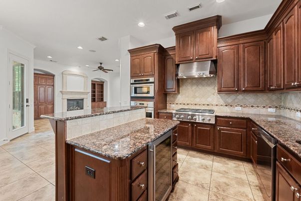 Fireplace, Interior, Kitchen, Recessed Lighting, Stainless Steel Appliances