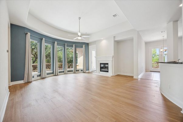 Empty room, Fireplace, Interior, Pendant Lights, Recessed Lighting, Wood Texture Flooring