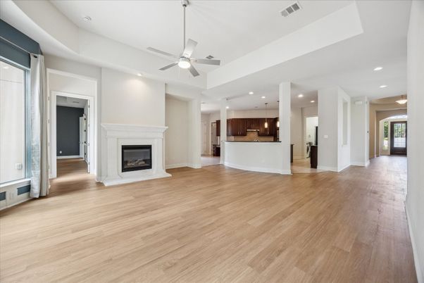 Empty room, Fireplace, Interior, Pendant Lights, Recessed Lighting, Wood Texture Flooring