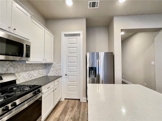 Interior, Kitchen, Recessed Lighting, Stainless Steel Appliances, Wood Texture Flooring