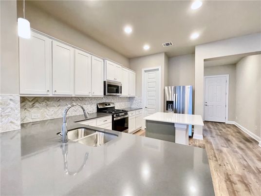 Interior, Kitchen, Pendant Lights, Recessed Lighting, Stainless Steel Appliances, Wood Texture Flooring