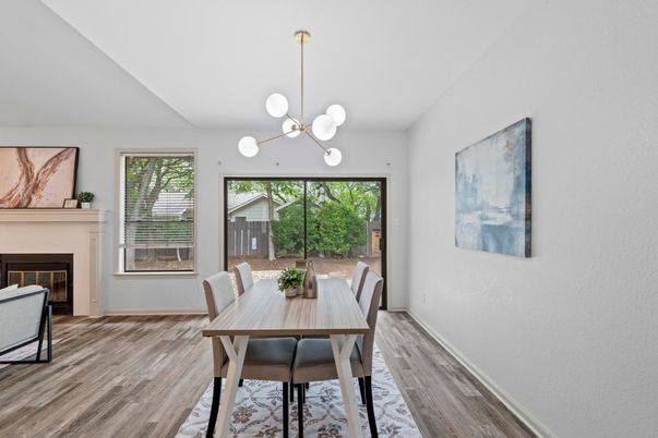 Dining room, Fireplace, Interior, Pendant Lights, Wood Texture Flooring