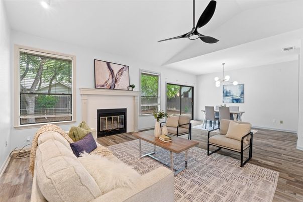 Chandelier, Dining room, Fireplace, Interior, Living room, Pendant Lights, Wood Texture Flooring