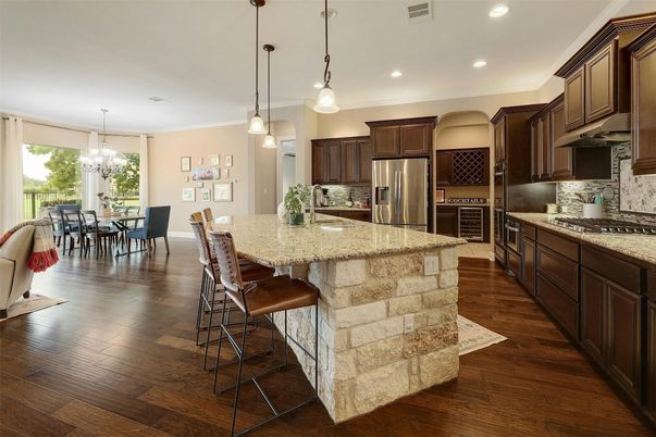 Chandelier, Dining room, Interior, Kitchen, Pendant Lights, Recessed Lighting, Stainless Steel Appliances, Wood Texture Flooring