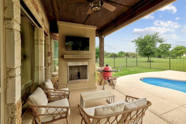 Exterior, Fireplace, Pool