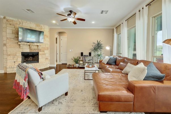 Fireplace, Interior, Living room, Recessed Lighting, Stone Walls, Wood Texture Flooring