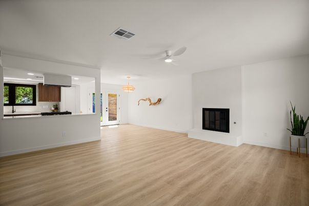 Empty room, Fireplace, Interior, Kitchen, Recessed Lighting, Wood Texture Flooring