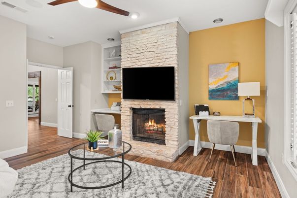 Fireplace, Interior, Living room, Recessed Lighting, Stone Walls, Wood Texture Flooring