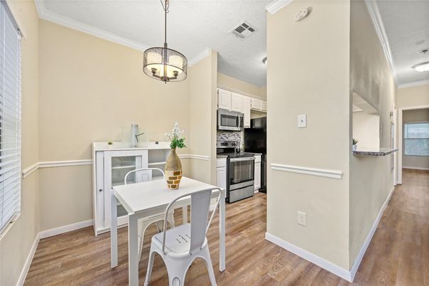 Dining room, Interior, Kitchen, Pendant Lights, Stainless Steel Appliances, Wood Texture Flooring