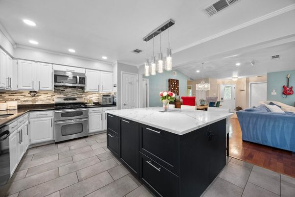 Interior, Kitchen, Pendant Lights, Recessed Lighting, Stainless Steel Appliances, Wood Texture Flooring