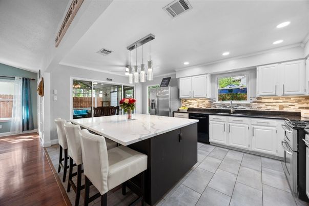 Interior, Kitchen, Pendant Lights, Recessed Lighting, Stainless Steel Appliances, Wood Texture Flooring