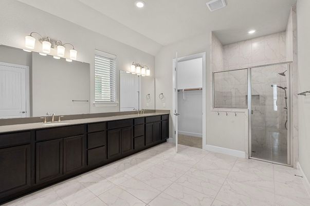 Bathroom, Dual Sink Vanities, Glass Shower, Interior, Marble, Marble Walls, Recessed Lighting