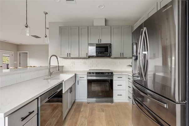 Interior, Kitchen, Pendant Lights, Recessed Lighting, Stainless Steel Appliances, Wood Texture Flooring