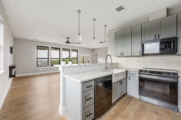 Interior, Kitchen, Pendant Lights, Recessed Lighting, Stainless Steel Appliances, Wood Texture Flooring