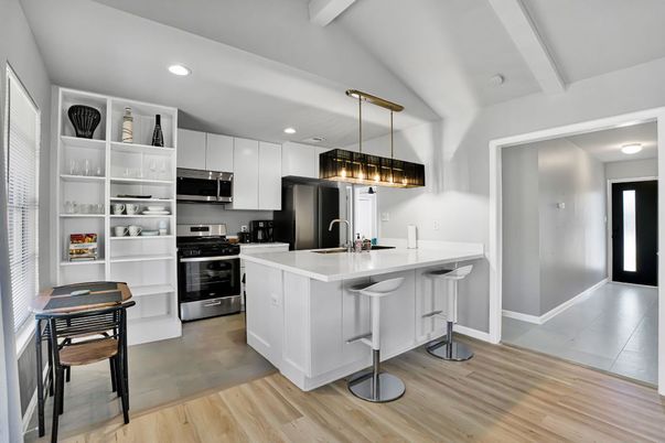 Interior, Kitchen, Pendant Lights, Recessed Lighting, Stainless Steel Appliances, Wood Texture Flooring