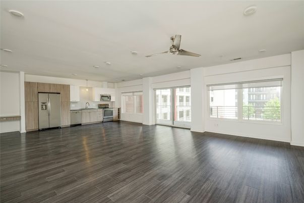 Empty room, Interior, Kitchen, Pendant Lights, Stainless Steel Appliances, Wood Texture Flooring