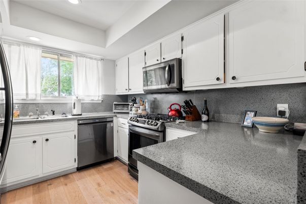 Interior, Kitchen, Recessed Lighting, Stainless Steel Appliances, Wood Texture Flooring