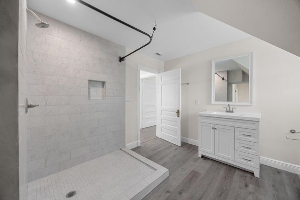 Bathroom, Dual Sink Vanities, Interior, Recessed Lighting, Wood Texture Flooring