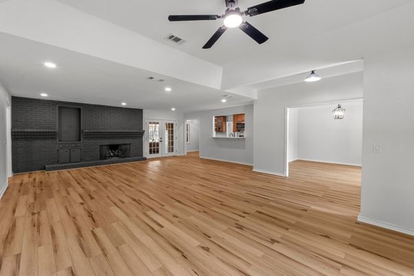 Empty room, Fireplace, Interior, Recessed Lighting, Wood Texture Flooring
