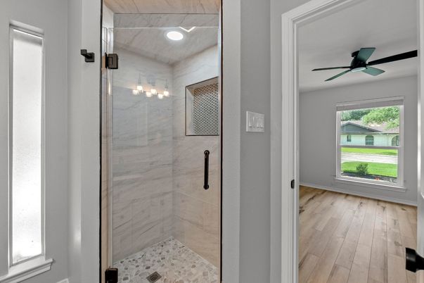 Bathroom, Glass Shower, Interior, Marble Walls, Recessed Lighting, Wood Texture Flooring