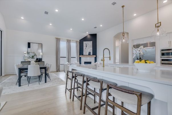 Dining room, Fireplace, Interior, Kitchen, Pendant Lights, Recessed Lighting, Stainless Steel Appliances, Wood Texture Flooring