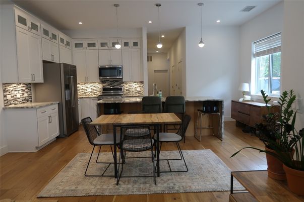 Dining room, Interior, Kitchen, Pendant Lights, Recessed Lighting, Stainless Steel Appliances, Wood Texture Flooring