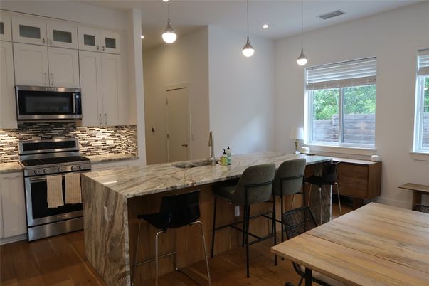 Interior, Kitchen, Pendant Lights, Recessed Lighting, Stainless Steel Appliances, Wood Texture Flooring