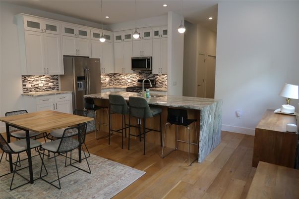 Interior, Kitchen, Pendant Lights, Recessed Lighting, Stainless Steel Appliances, Wood Texture Flooring