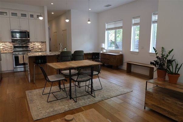 Dining room, Interior, Kitchen, Pendant Lights, Recessed Lighting, Stainless Steel Appliances, Wood Texture Flooring