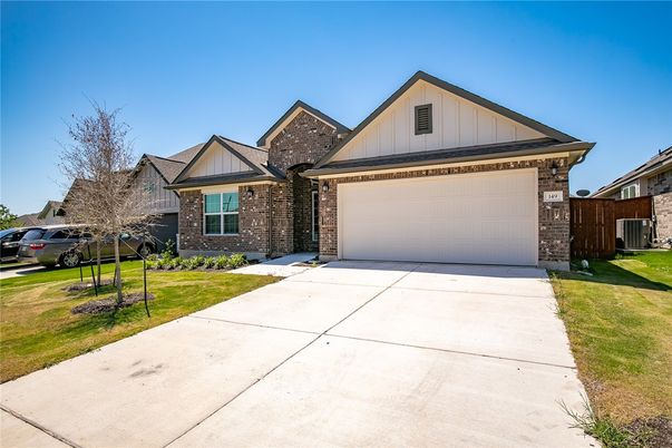 Attached, Exterior, Facade, Brick Facade, Brick Traditional