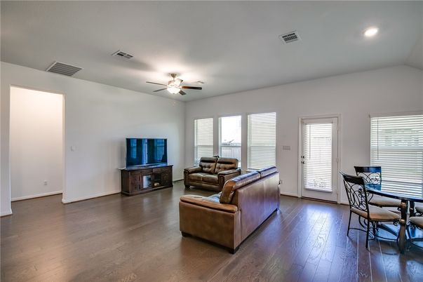 Dining room, Fireplace, Interior, Living room, Recessed Lighting, Wood Texture Flooring