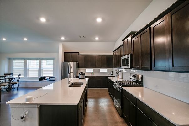 Dining room, Interior, Kitchen, Recessed Lighting, Stainless Steel Appliances, Wood Texture Flooring