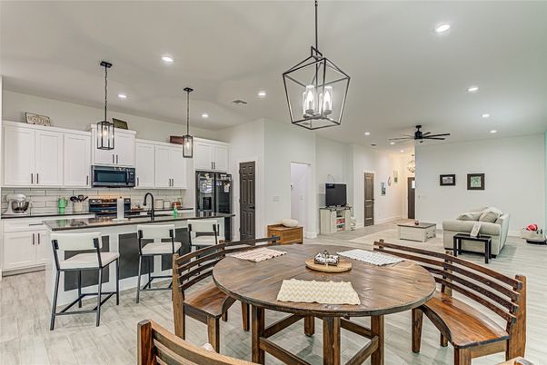 Dining room, Interior, Kitchen, Living room, Pendant Lights, Recessed Lighting, Wood Texture Flooring