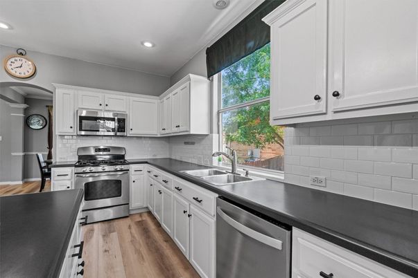 Interior, Kitchen, Recessed Lighting, Stainless Steel Appliances, Wood Texture Flooring