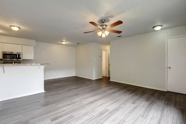 Empty room, Interior, Kitchen, Stainless Steel Appliances, Wood Texture Flooring