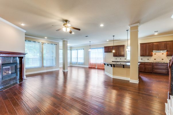 Empty room, Fireplace, Interior, Kitchen, Pendant Lights, Recessed Lighting, Wood Texture Flooring