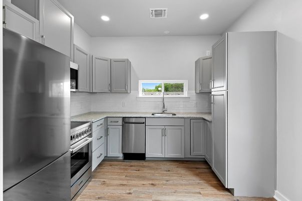 Interior, Kitchen, Recessed Lighting, Stainless Steel Appliances, Wood Texture Flooring