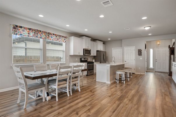 Dining room, Interior, Kitchen, Recessed Lighting, Stainless Steel Appliances, Wood Texture Flooring