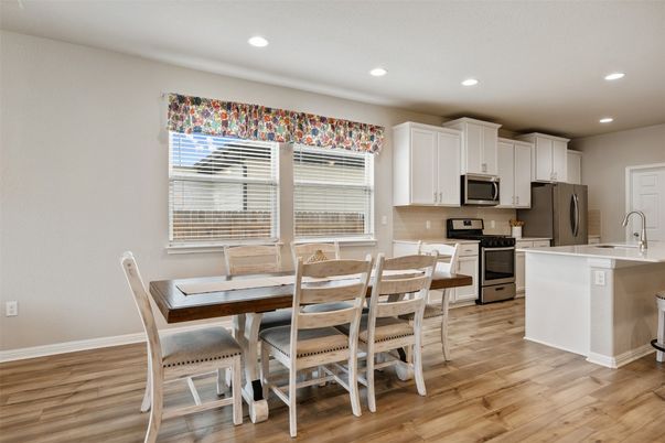 Dining room, Interior, Kitchen, Recessed Lighting, Stainless Steel Appliances, Wood Texture Flooring