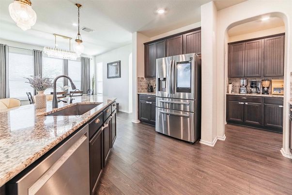 Chandelier, Interior, Kitchen, Pendant Lights, Recessed Lighting, Stainless Steel Appliances, Wood Texture Flooring