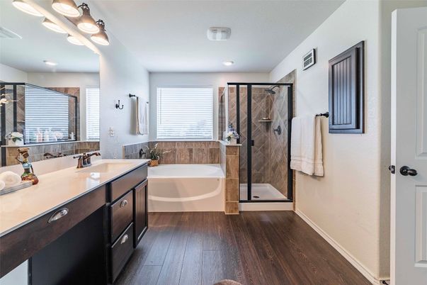 Bathroom, Dual Sink Vanities, Glass Shower, Interior, Recessed Lighting, Wood Texture Flooring
