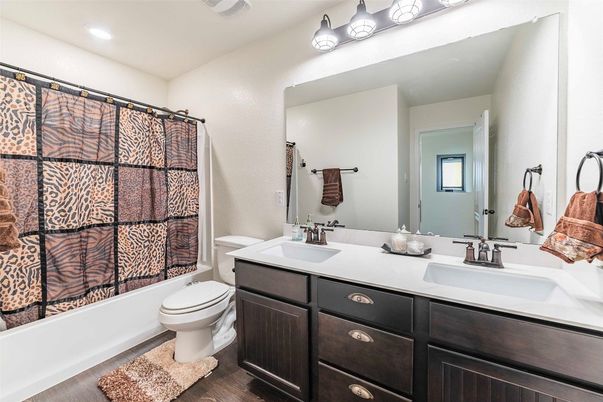 Bathroom, Dual Sink Vanities, Interior, Recessed Lighting, Wood Texture Flooring