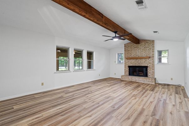 Empty room, Fireplace, Interior, Stone Walls, Wooden Beams, Wood Texture Flooring
