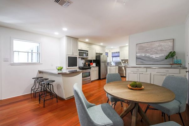 Dining room, Interior, Kitchen, Recessed Lighting, Stainless Steel Appliances, Wood Texture Flooring