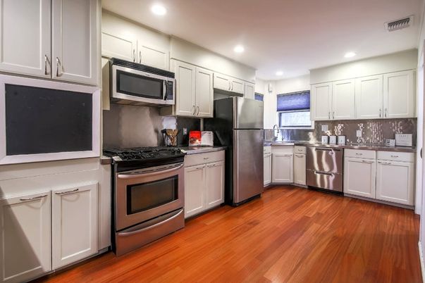 Interior, Kitchen, Recessed Lighting, Stainless Steel Appliances, Wood Texture Flooring