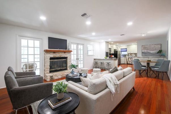 Dining room, Fireplace, Interior, Kitchen, Living room, Recessed Lighting, Stainless Steel Appliances, Wood Texture Flooring
